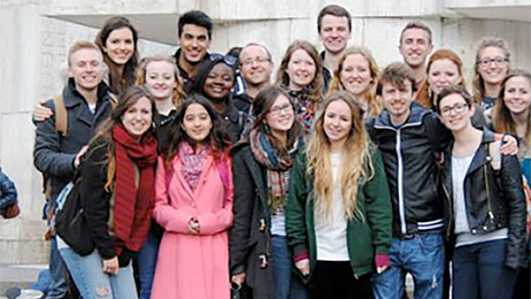 Educational school tour group pose for a picture